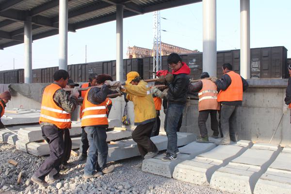 handing railway sleepers